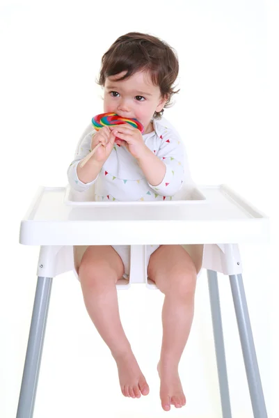 Baby isst Lollypop — Stockfoto