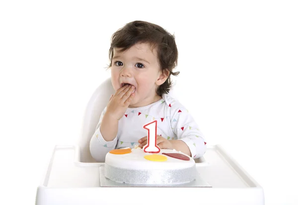 Dítě jíst narozeninový dort — Stock fotografie