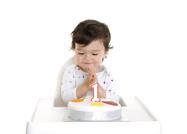 Baby begeistert von erster Geburtstagstorte — Stockfoto