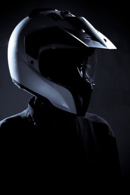 Motorcycle biker rider with protective helmet clipart