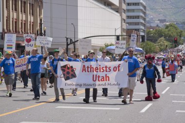 Salt Lake City, Utah - June 3: Atheists of Utah members marching clipart