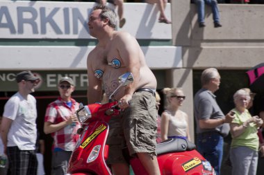 Salt Lake City, Utah - June 3: Pride Parade participants marchin clipart