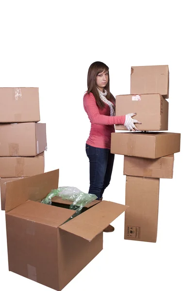 Ung flicka packar ihop och flyttar - isolerade — Stockfoto