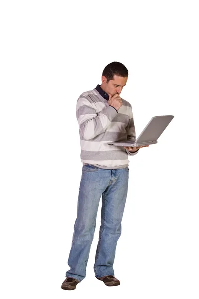 Uomo d'affari in posa con il suo computer portatile — Foto Stock