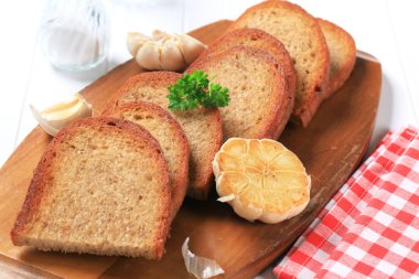 Pan fried bread and garlic clipart