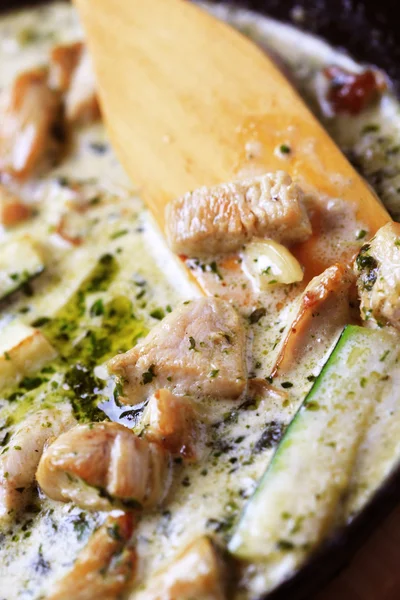 stock image Chicken meat and courgette in cream sauce