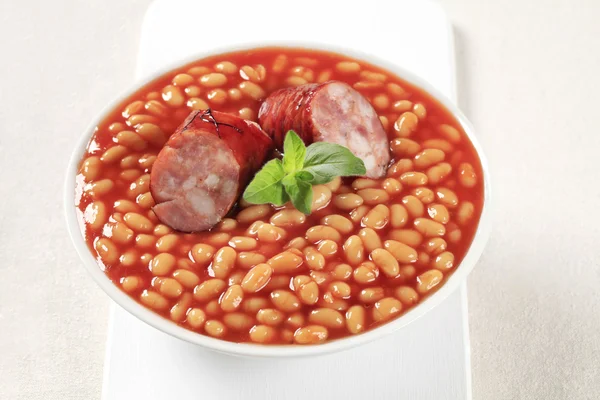 Baked beans and sausage — Stock Photo, Image