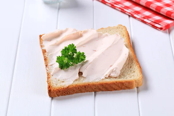 Bread with savory spread — Stock Photo, Image