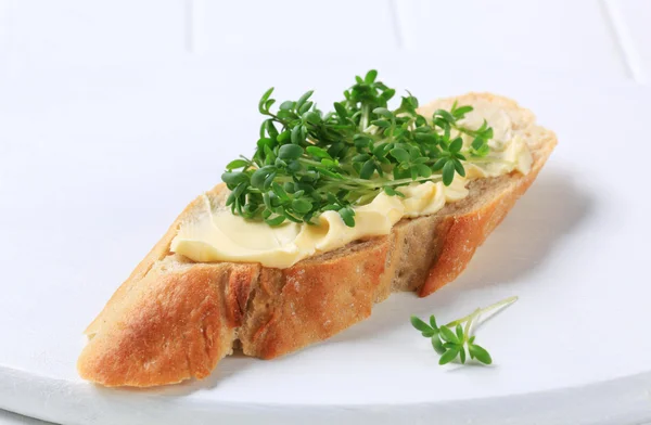 Bread with butter and cress — Stock Photo, Image