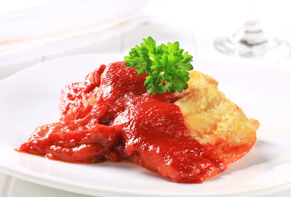 White fish fillets with tomato sauce — Stock Photo, Image