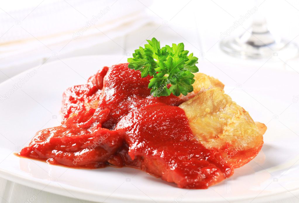 White fish fillets with tomato sauce