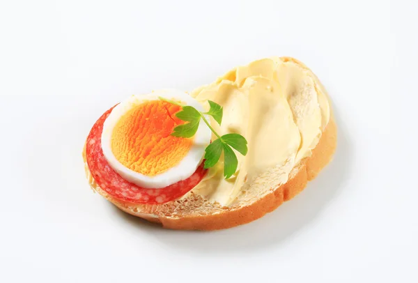 Bread with salami and egg — Stock Photo, Image
