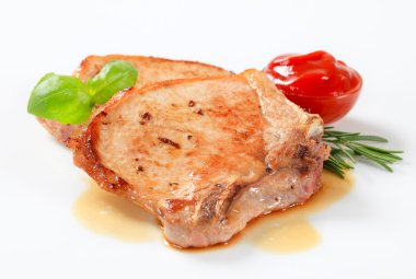 Pan-fried pork chops clipart