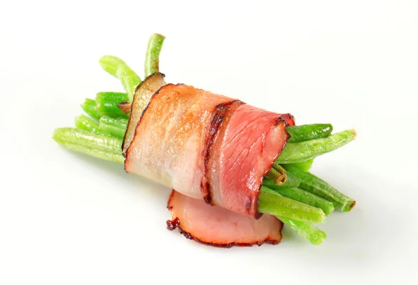 String beans wrapped in bacon — Stock Photo, Image