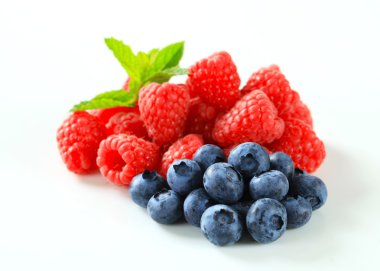 Fresh raspberries and blueberries clipart