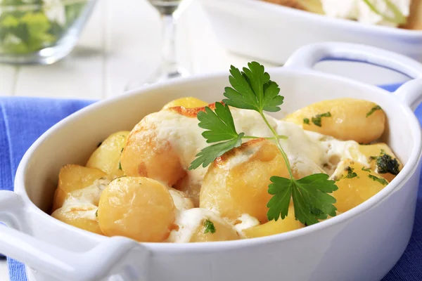 Potatoes and cream — Stock Photo, Image