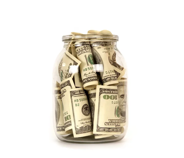 One hundred dollar bills in a glass jar — Stock Photo, Image