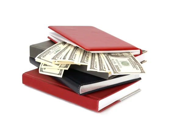 stock image Hundred dollar bills money and a stack of notebooks