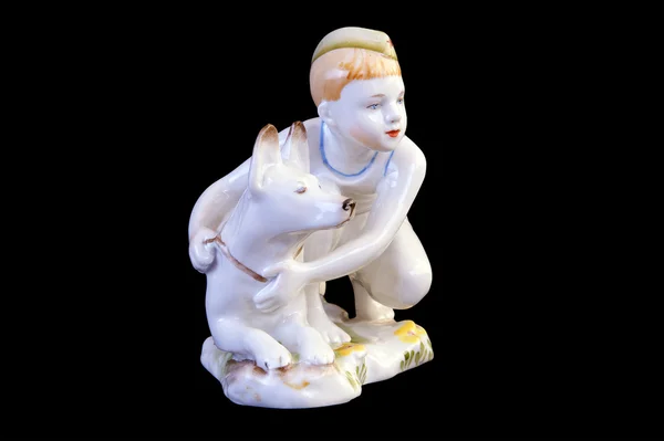Escultura "Rapaz com um cão. O jovem guarda de fronteira ". Figurinha de porcelana da URSS, 1952 — Fotografia de Stock