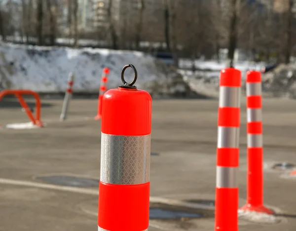 stock image Colourful bollards in the parking lot