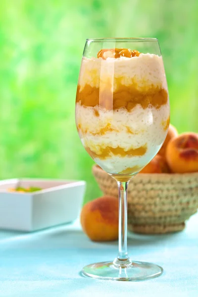 Rice Pudding with Peach Compote — Stock Photo, Image