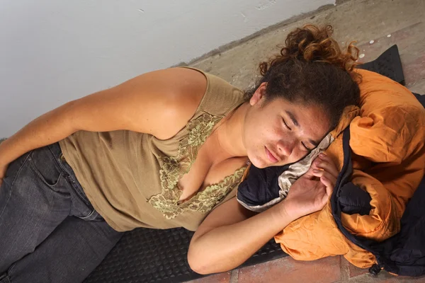 Young Peruvian Woman Squatting