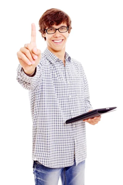 Junger Mann mit Tablet-PC zeigt Zeigefinger — Stockfoto