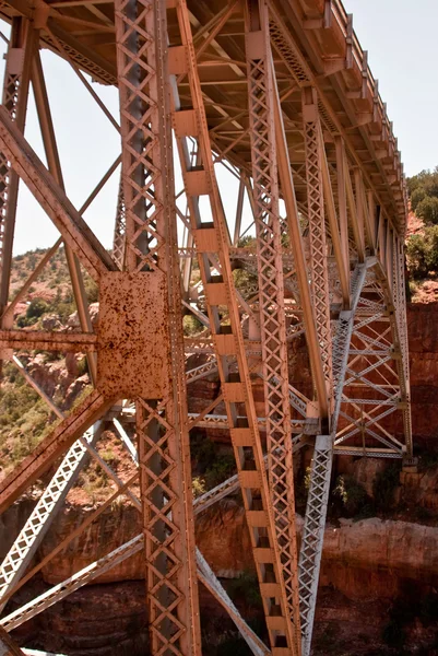 stock image Metal bridge spans canyon