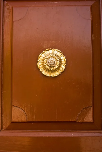Brown Colonial Door with Gold Sunburst — Stock Photo, Image