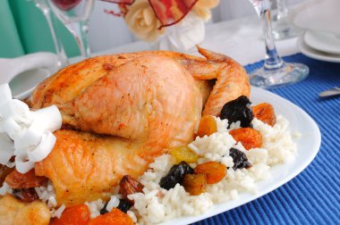 Grilled chicken with rice and dried fruits clipart