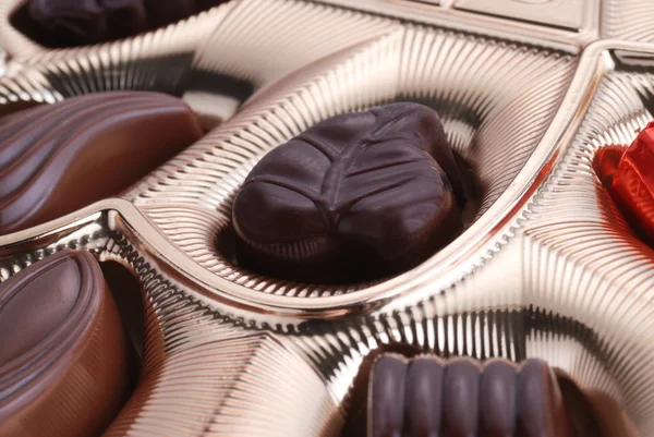 Chocolates in foil box — Stock Photo, Image