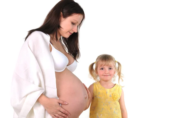 Pregnancy woman and her daughter — Stock Photo, Image