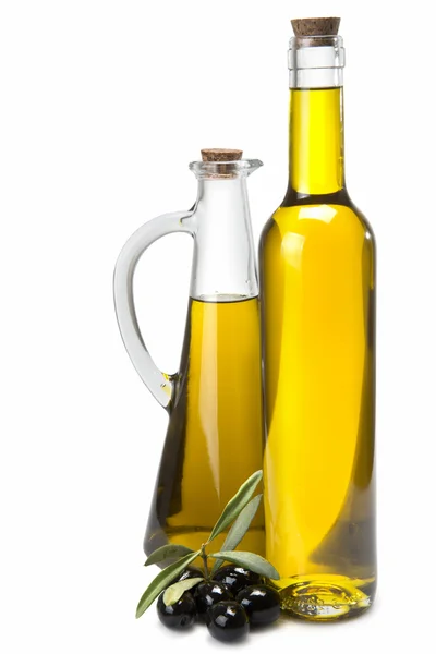 Kruik en fles met olijfolie. — Stockfoto