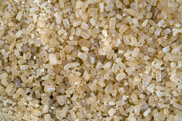 Желтые кристаллы тростникового сахара — стоковое фото