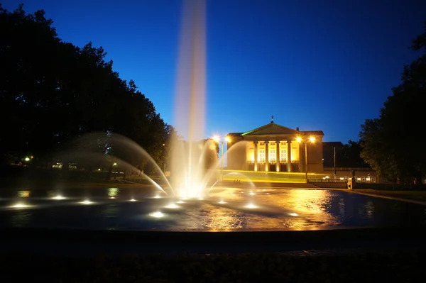 stock image Fountain before opera house in Poznan at night