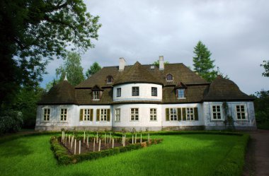 Manor house - museum in village clipart