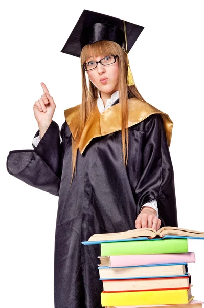 Cute young woman in a graduation gown — Stock Photo, Image