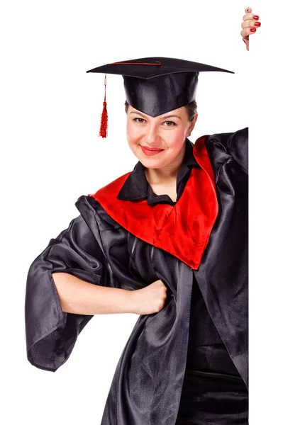 Happy graduating woman holding a display for text — Stock Photo, Image