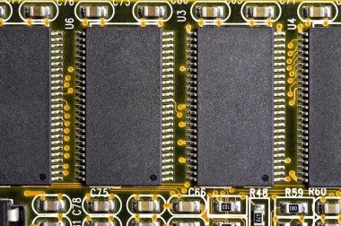 Close-up of four computer chips clipart