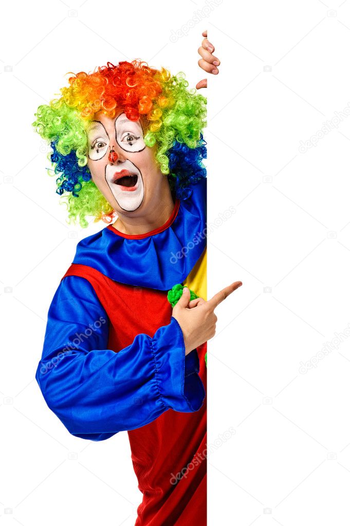 Happy clown holding the blank board