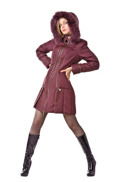 Nő a lila téli kapucnis kabát, fehér háttér — Stock Fotó
