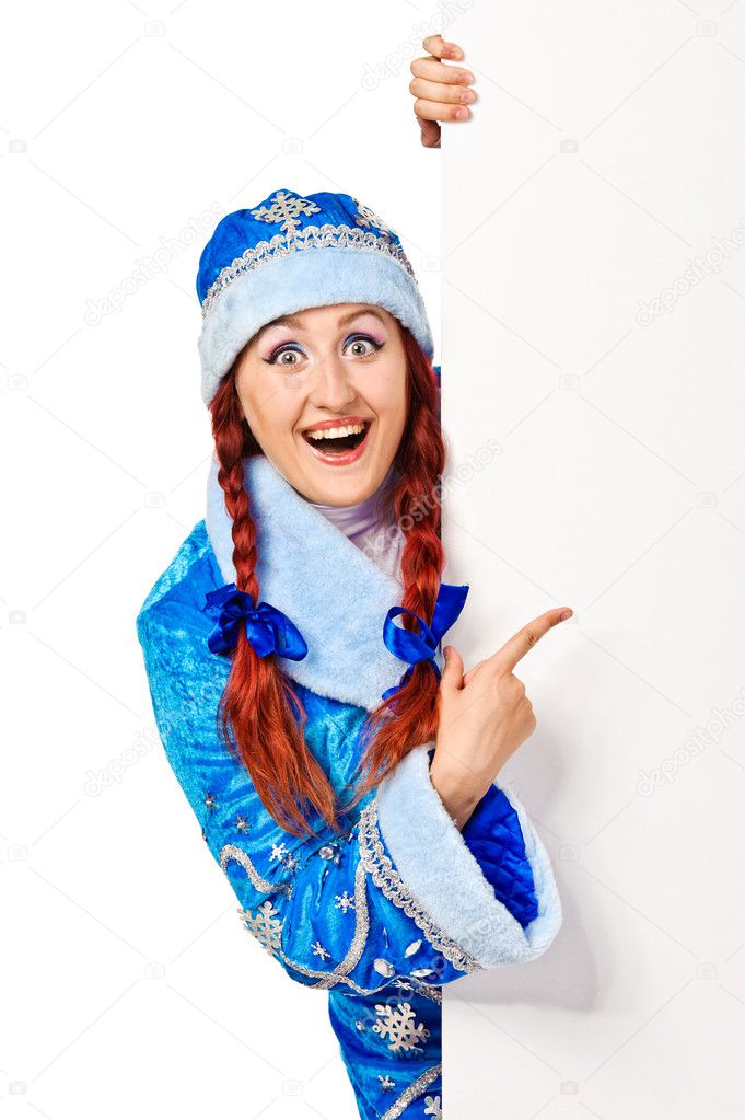 Surprised girl dressing in traditional russian christmas costume