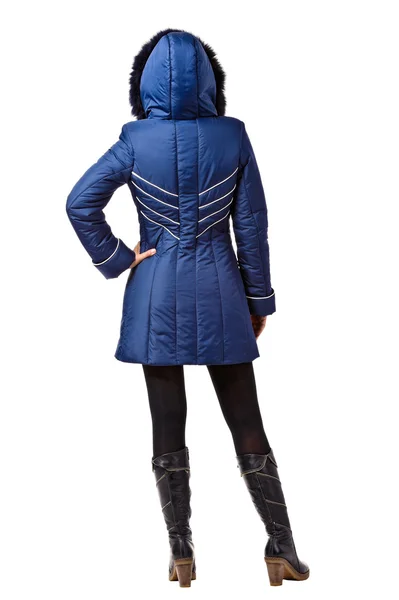 Вид сзади на женщину в зимней синей куртке с капюшоном на белой спине — стоковое фото