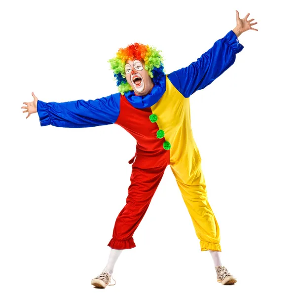 Смешной клоун стоит на белом фоне — стоковое фото