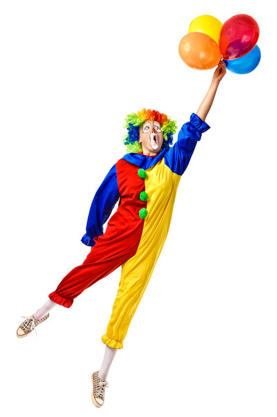 Flying birthday clown with a bunch of balloons