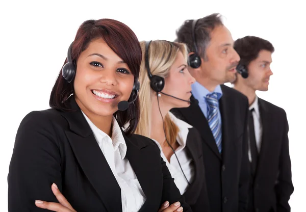 Selbstbewusstes Business-Team mit Headsets — Stockfoto