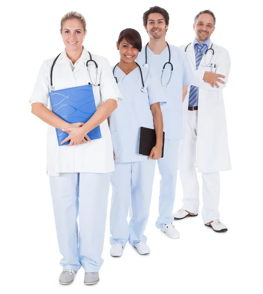 Grupp läkare står tillsammans över vit — Stockfoto