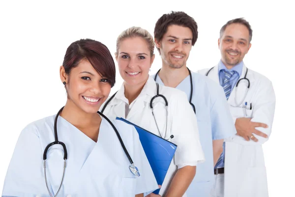 Grupa lekarzy razem stojący nad białym — Zdjęcie stockowe