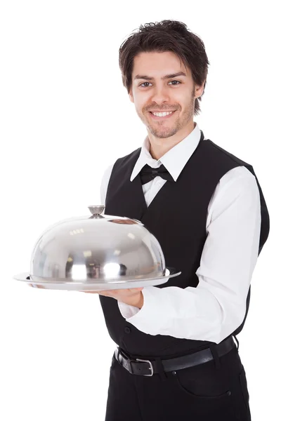 Portrait of a butler with bow tie and tray — Stock Photo, Image