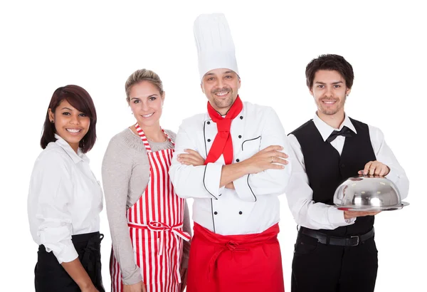 Groep van chef-kok en obers — Stockfoto